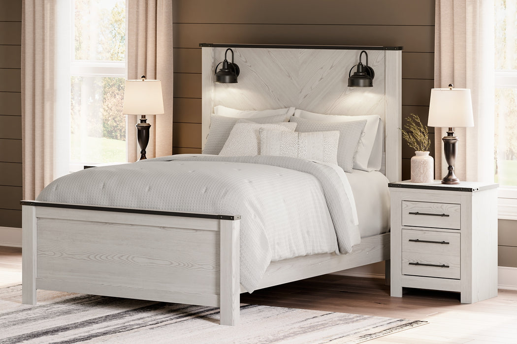 Schoenberg Queen Panel Bed with Mirrored Dresser, Chest and 2 Nightstands