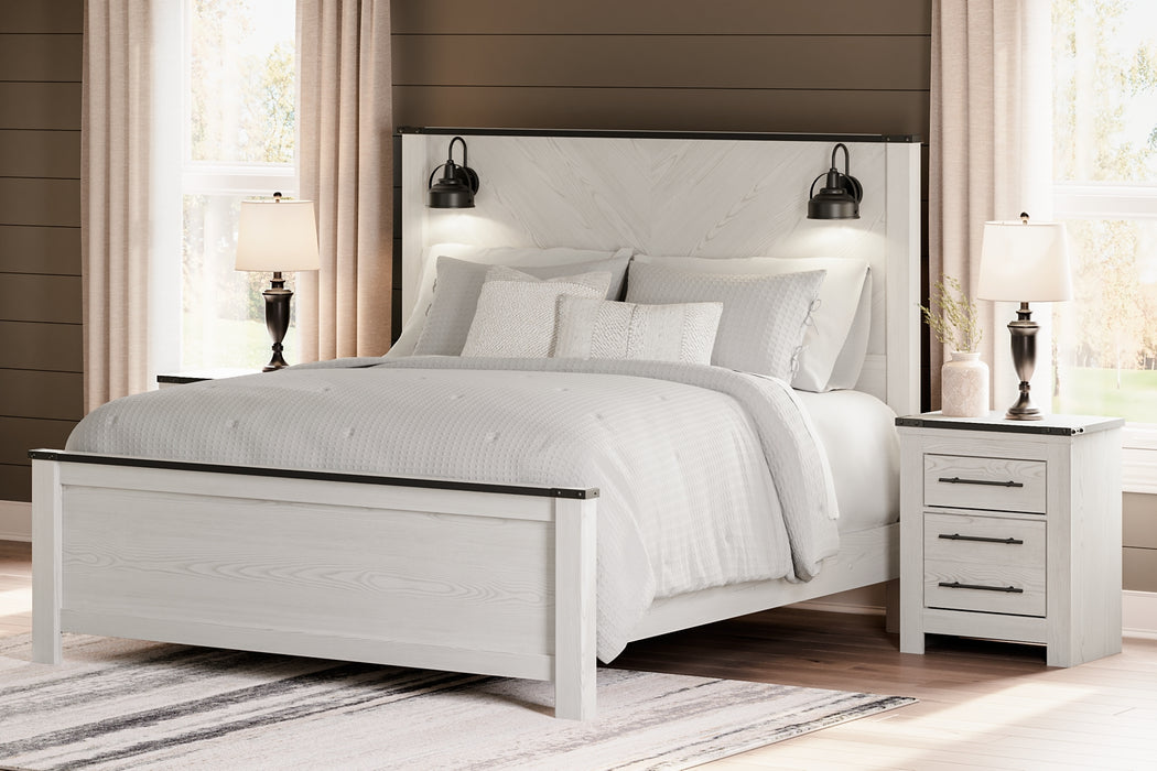 Schoenberg King Panel Bed with Mirrored Dresser and 2 Nightstands