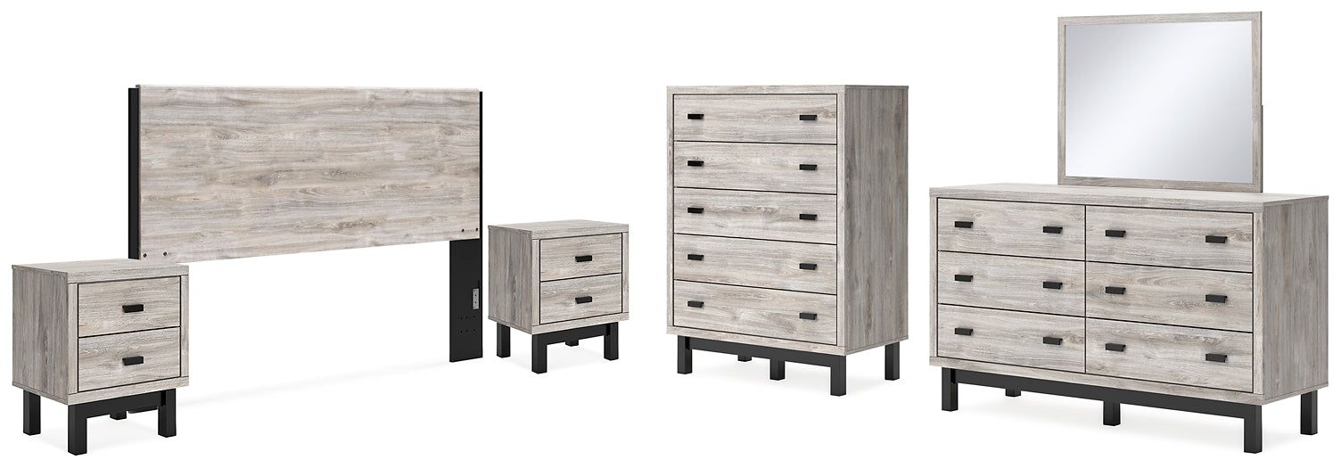 Vessalli King Panel Headboard with Mirrored Dresser, Chest and 2 Nightstands