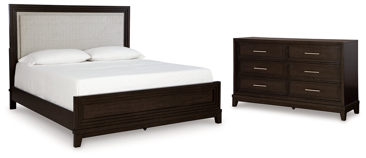 Neymorton King Upholstered Panel Bed with Dresser